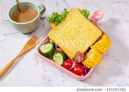 healthy Pumpkin Bread Breakfast Meal Served With Fresh Corn And Salad Vegetables 141501592