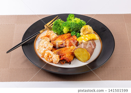low Calorie Fitness Meal With Boiled Shrimps Hard Boiled Eggs Purple Sweet Potatoes And Greens low Calorie Fitness Meal With Boiled Shrimps Hard Boiled Eggs Purple Sweet Potatoes And Greens 141501599