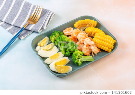 low Calorie Fitness Meal With Boiled Shrimps Hard Boiled Eggs Purple Sweet Potatoes And Greens low Calorie Fitness Meal With Boiled Shrimps Hard Boiled Eggs Purple Sweet Potatoes And Greens 141501602