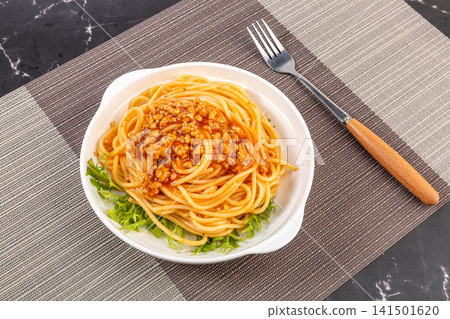 classic Italian Spaghetti Pasta With Rich Tomato Meat Sauce And Fresh Lettuce classic Italian Spaghetti Pasta With Rich Tomato Meat Sauce And Fresh Lettuce 141501620