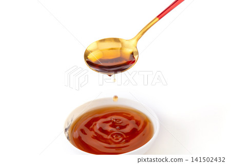 clear amber fish sauce traditional fermented condiment for Southeast Asian cuisine clear amber fish sauce traditional fermented condiment for Southeast Asian cuisine 141502432