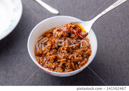 savory minced meat sauce chunky chili paste with rich umami for rice topping savory minced meat sauce chunky chili paste with rich umami for rice topping 141502467