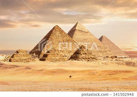 Majestic Great Pyramids of Giza at sunset, Cairo, Egypt Majestic Great Pyramids of Giza at sunset, Cairo, Egypt 141502948