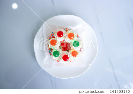 butter cake or coconut cake or sponge cake or a pound of cake with jelly topping butter cake or coconut cake or sponge cake or a pound of cake with jelly topping 141503180