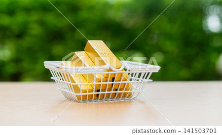 Gold bars placed in a shopping basket, concept investment, wealth preservation, and precious metal purchasing. Gold bars placed in a shopping basket, concept investment, wealth preservation, and precious metal purchasing. 141503701