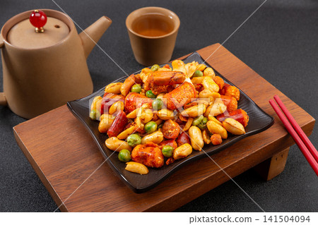 spicy crispy chili pepper crusts mixed with roasted peanuts snack spicy crispy chili pepper crusts mixed with roasted peanuts snack 141504094