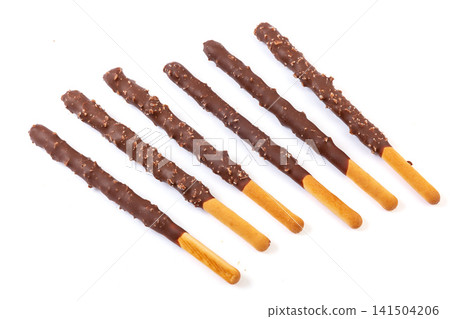 chocolate coated biscuit sticks with popping candy crystals chocolate coated biscuit sticks with popping candy crystals 141504206