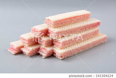 pwafer biscuits, strawberry cheese, layered wafers, pink cream, fruit flavor, crispy texture, rectangular strips, crunchy cookies, sweet pastry, confectionery, afternoon tea, tea snack, dessert pwafer biscuits, strawberry cheese, layered wafers, pink cream, fruit flavor, crispy texture, rectangular strips, crunchy cookies, sweet pastry, confectionery, afternoon tea, tea snack, dessert 141504224