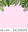 Top border frame made of green tropical leaves on pink background 141506065