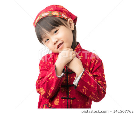 A portrait of an Asian girl in ethnic minority clothing standing against a white background. A portrait of an Asian girl in ethnic minority clothing standing against a white background. 141507762