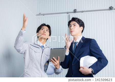 A businessman wearing work clothes 141509623