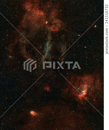 Bright stars illuminate glowing clouds of gas and dust in the deep, silent expanse of space. 141510732