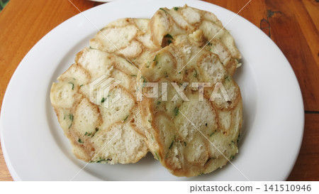 Slices of Traditional Bread Dumplings on a White Plate Slices of Traditional Bread Dumplings on a White Plate 141510946