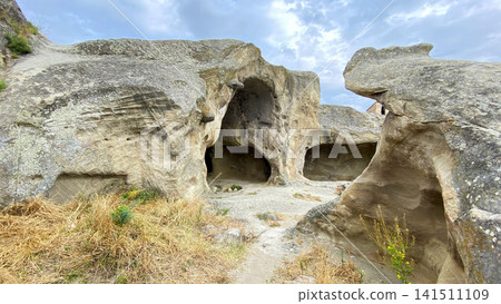 Weathered sandstone cavities at Uplistsikhe combine natural erosion with ancient carving in Georgia, supporting geological education Weathered sandstone cavities at Uplistsikhe combine natural erosion with ancient carving in Georgia, supporting geological education 141511109