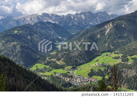 High View over San Vigilio di Marebbe and the Forested Dolomite Valley High View over San Vigilio di Marebbe and the Forested Dolomite Valley 141511265