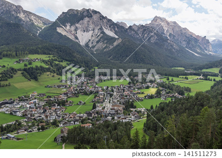 Village Center of San Vigilio di Marebbe Seen from a Green Hillside in South Tyrol Village Center of San Vigilio di Marebbe Seen from a Green Hillside in South Tyrol 141511273