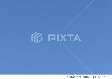 Plain Cloudless Blue Sky Background with Clean Central Copy Space for Design Plain Cloudless Blue Sky Background with Clean Central Copy Space for Design 141511302