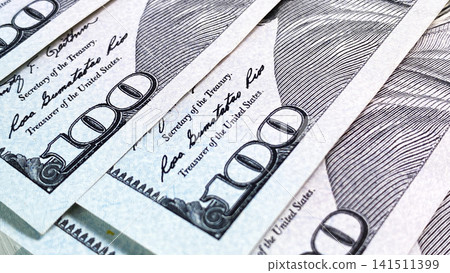 $100 bills. Close-up. American national currency, close-up. Cash banknotes. Background of cash dollar bills. Background of money. $100 bills. Close-up. American national currency, close-up. Cash banknotes. Background of cash dollar bills. Background of money. 141511399