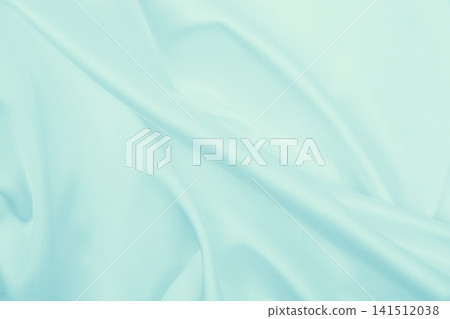 Smooth elegant blue silk or satin luxury cloth texture as abstract background. Luxurious background design Smooth elegant blue silk or satin luxury cloth texture as abstract background. Luxurious background design 141512038