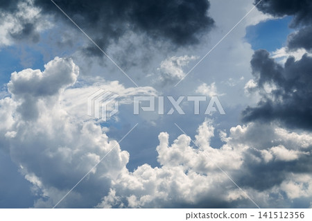 Dramatic Storm Clouds with Sunlight Breaking Through Before Rain. Weather. Dramatic Storm Clouds with Sunlight Breaking Through Before Rain. Weather. 141512356