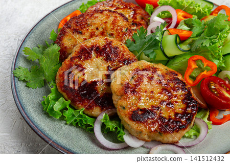 fried chicken cutlets, minced chicken, with vegetables, on gray , with vegetable salad, top view, homemade, no people, fried chicken cutlets, minced chicken, with vegetables, on gray , with vegetable salad, top view, homemade, no people, 141512432