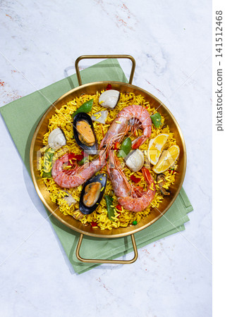 Seafood paella, shrimp and mussel risotto, rice, paella in a pan, homemade, natural light, top view, no people, Seafood paella, shrimp and mussel risotto, rice, paella in a pan, homemade, natural light, top view, no people, 141512468