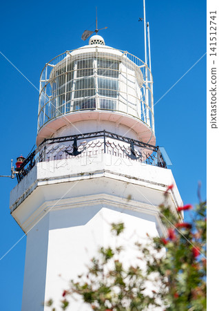 The white lighthouse on Batumi Boulevard against a bright blue sky, Georgia The white lighthouse on Batumi Boulevard against a bright blue sky, Georgia 141512741