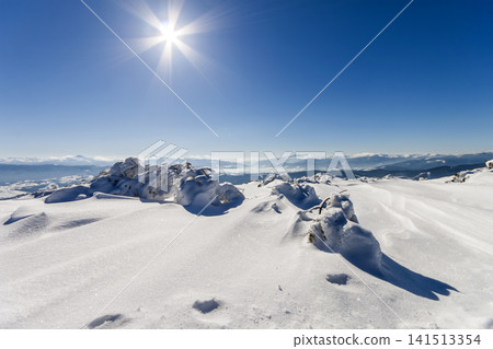 Snow covered winter mountains. Arctic landscape. Colorful outdoor scene, Artistic style post processed photo. Snow covered winter mountains. Arctic landscape. Colorful outdoor scene, Artistic style post processed photo. 141513354