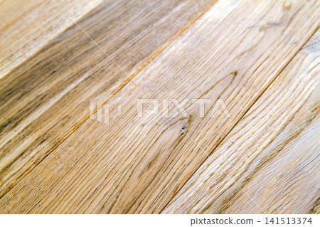 Several planks of beautiful laminate or parquet flooring with wooden texture as background Several planks of beautiful laminate or parquet flooring with wooden texture as background 141513374