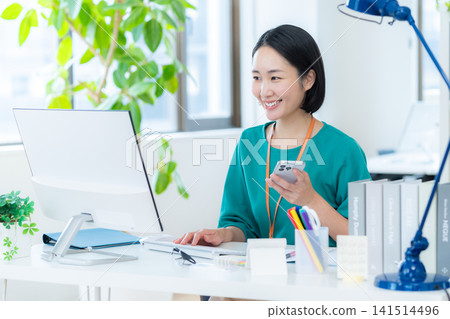 Business woman working in the office Business woman working in the office 141514496