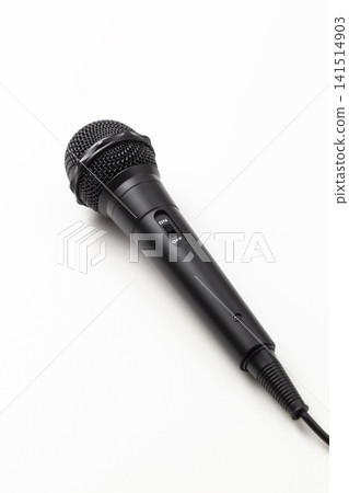 Microphone on a white background Microphone on a white background 141514903