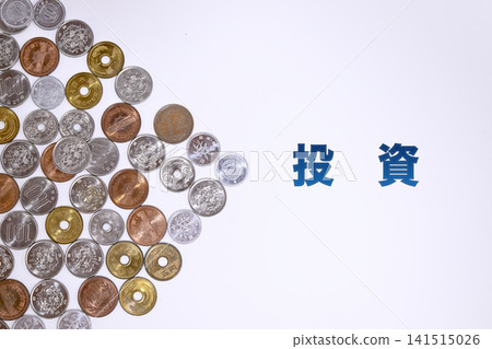 Investment text and Japanese yen coins Investment text and Japanese yen coins 141515026