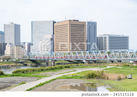 [Keikyu Main Line] Express train bound for Yokohama crossing the Tamagawa River 141515118