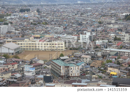 April 27 2026 MORIOKA, JAPAN. Wide view of city rooftops with elevated railway April 27 2026 MORIOKA, JAPAN. Wide view of city rooftops with elevated railway 141515359