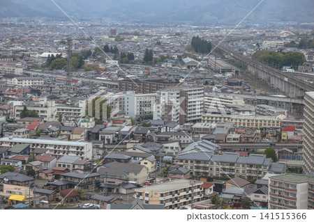 April 27 2026 MORIOKA, JAPAN. Wide view of city rooftops with elevated railway April 27 2026 MORIOKA, JAPAN. Wide view of city rooftops with elevated railway 141515366