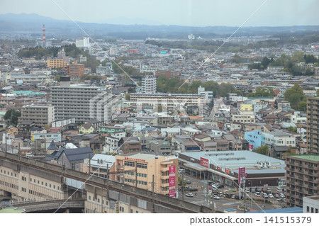 April 27 2026 MORIOKA, JAPAN. Wide view of city rooftops with elevated railway April 27 2026 MORIOKA, JAPAN. Wide view of city rooftops with elevated railway 141515379