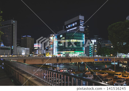 April 27 2026 Sendai Station night walkway with pedestrians and illuminated facade April 27 2026 Sendai Station night walkway with pedestrians and illuminated facade 141516245