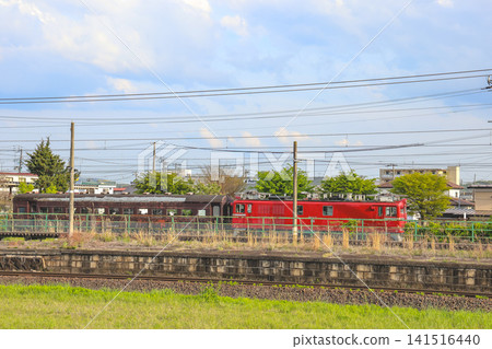 April 28 2026 Red electric locomotive passing suburban railway near Hitome Senbon Zakura April 28 2026 Red electric locomotive passing suburban railway near Hitome Senbon Zakura 141516440