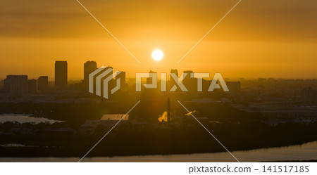 View from above of contemporary high skyscraper buildings in downtown district of Tampa city in Florida, USA at sunset. American megapolis with business financial district 141517185
