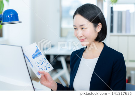 Business woman working in the office Business woman working in the office 141517655