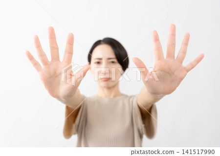 A woman in a short-sleeved knit top - Lifestyle image A woman in a short-sleeved knit top - Lifestyle image 141517990