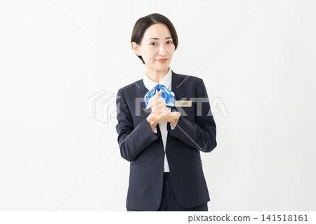 Female receptionist in uniform - Job image Female receptionist in uniform - Job image 141518161