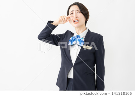 身著制服的女接待員 - 工作圖片 身著制服的女接待員 - 工作圖片 141518166