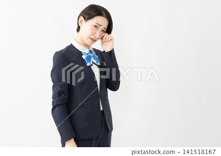 身著制服的女接待員 - 工作圖片 身著制服的女接待員 - 工作圖片 141518167