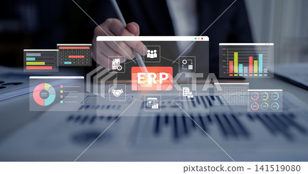 Business Professional Managing Data Visualization and Analytics with ERP System on Screen, Modern Digital Workspace Concept. Glyphic 141519080