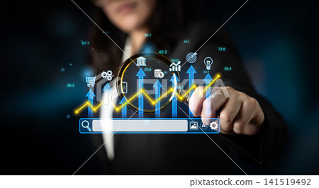 Businesswoman Interacting with Digital Data Graphs and Growth Indicators in a Technology-Driven Environment for Financial Analysis and Reporting. Entropy Businesswoman Interacting with Digital Data Graphs and Growth Indicators in a Technology-Driven Environment for Financial Analysis and Reporting. Entropy 141519492