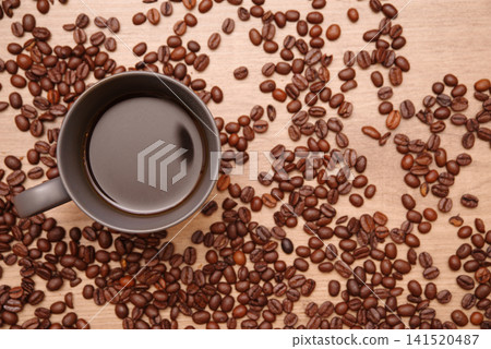 Lots of coffee beans and the background of a cup Lots of coffee beans and the background of a cup 141520487
