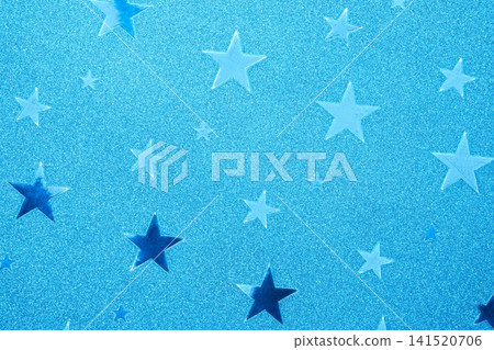 A background image featuring a close-up of metallic colored paper with a star pattern. A background image featuring a close-up of metallic colored paper with a star pattern. 141520706