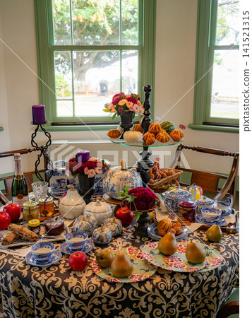 Flowers, fruits, and decorations set up in a Western-style mansion for a Halloween party. Flowers, fruits, and decorations set up in a Western-style mansion for a Halloween party. 141521315