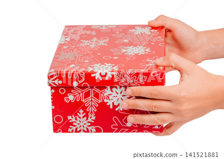 Hands Holding Red Christmas Gift Box Isolated on White Background 141521881